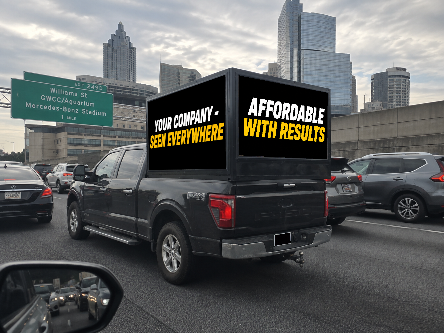 Eye Level Mobile truck in rush-hour traffic